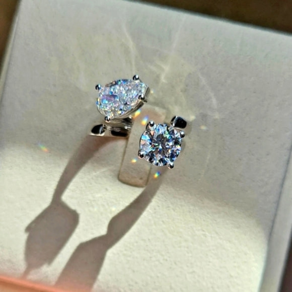 2.5ct pear moissanite and 2ct round moissanite ring in Sterling silver